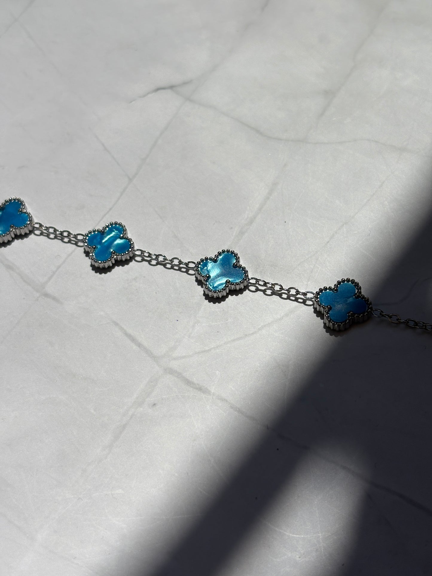 Clover Blue/gold/silber